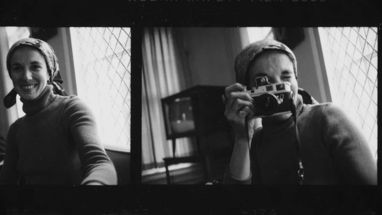 a woman with a camera